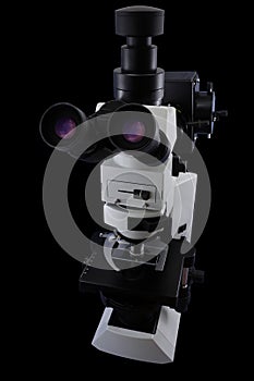 Oculars side research microscope view isolated on a black background photo